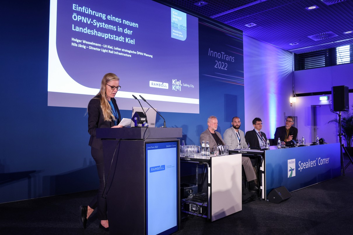 A woman speaking at the speakers' corner at InnoTrans.