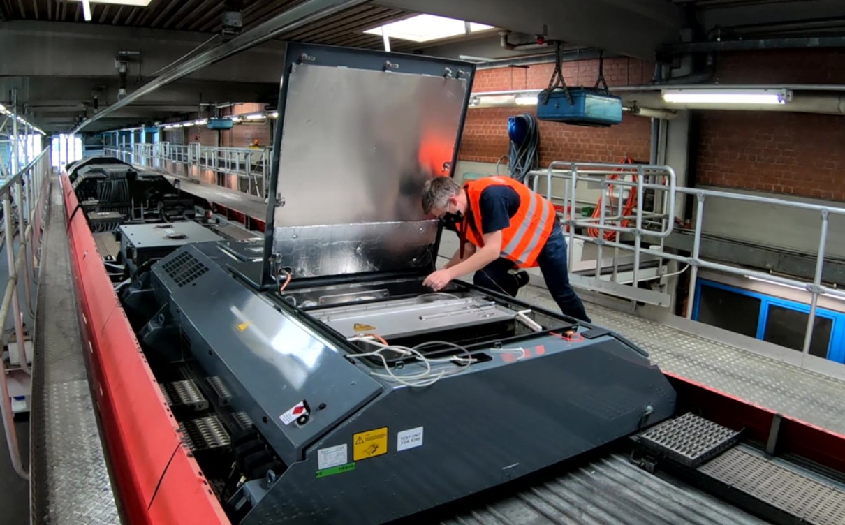 Airconditioning is being installed inside a train. Airconditioning is being installed inside a train.